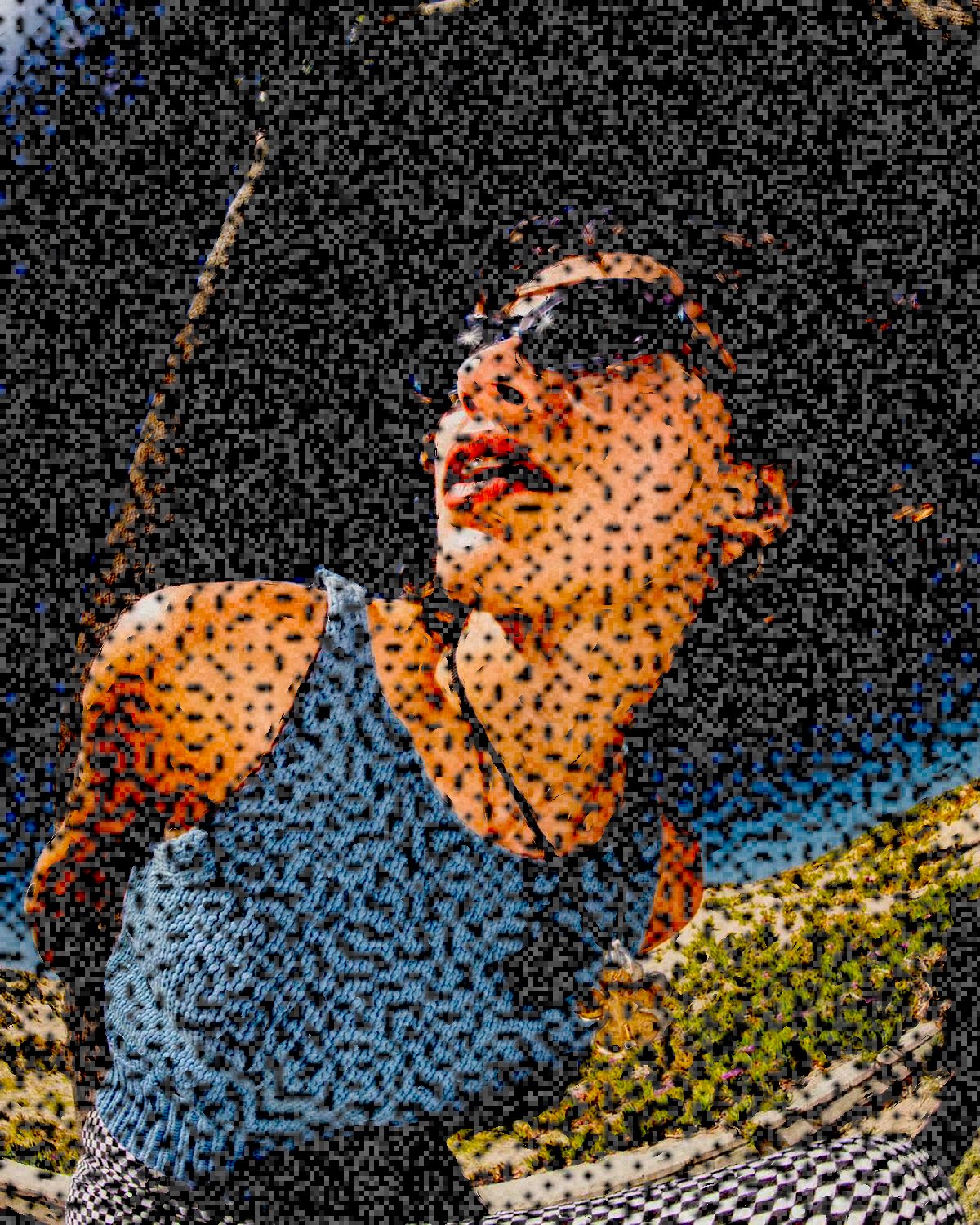 Colour photocopy effect on a portrait of a woman in sunglasses against a blue sky, made with the Colour Threshold filter in Filter Archive (Blown Toner preset)