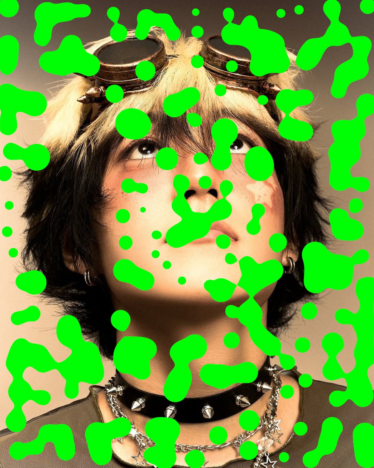 Metaball effect on a portrait of a person with goggles looking up, made with the Acid filter in Filter Archive (Slime preset)