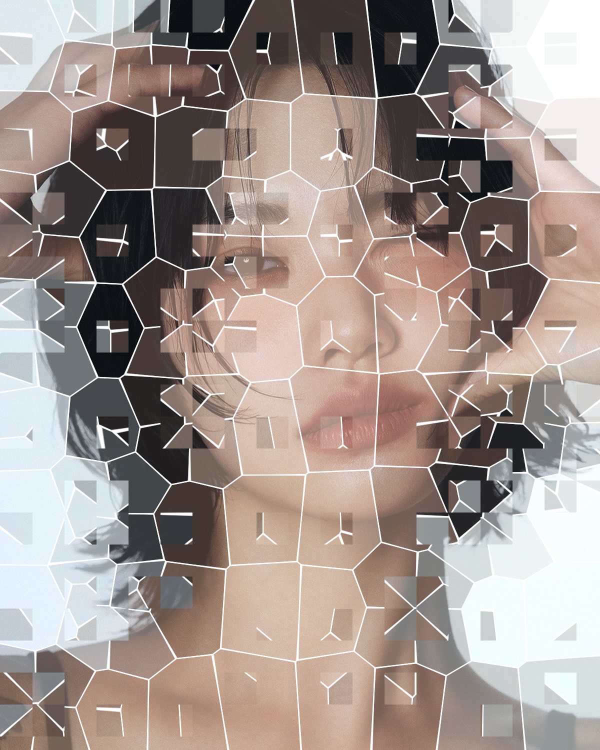 Mosaic effect on a portrait of a woman with black hair, hands on her head, made with the Cell filter in Filter Archive (Ghost Grid preset)