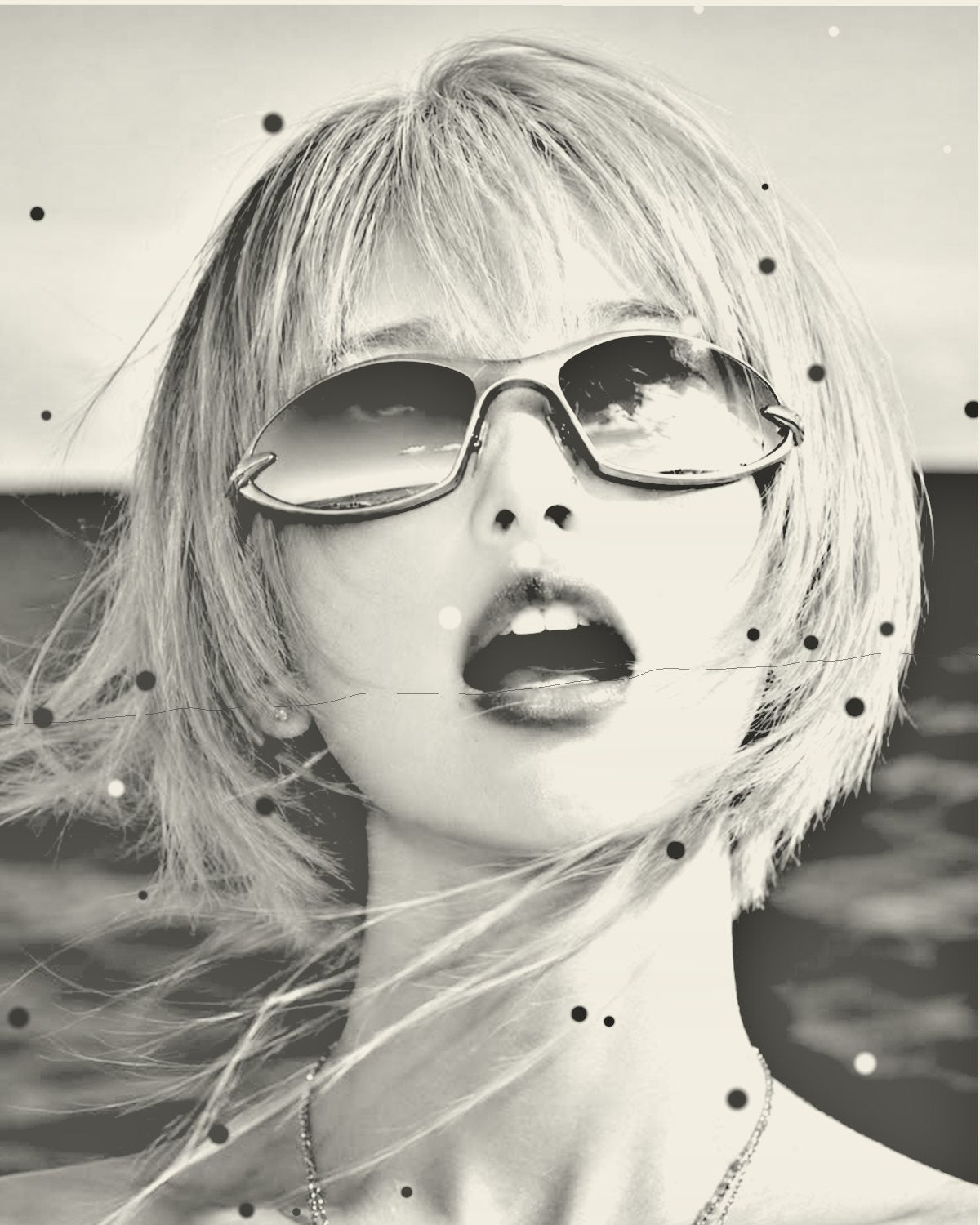 Photocopy effect on a portrait of a woman with silver hair and blue sunglasses by the sea, made with the Receipt filter in Filter Archive (Second Generation preset)