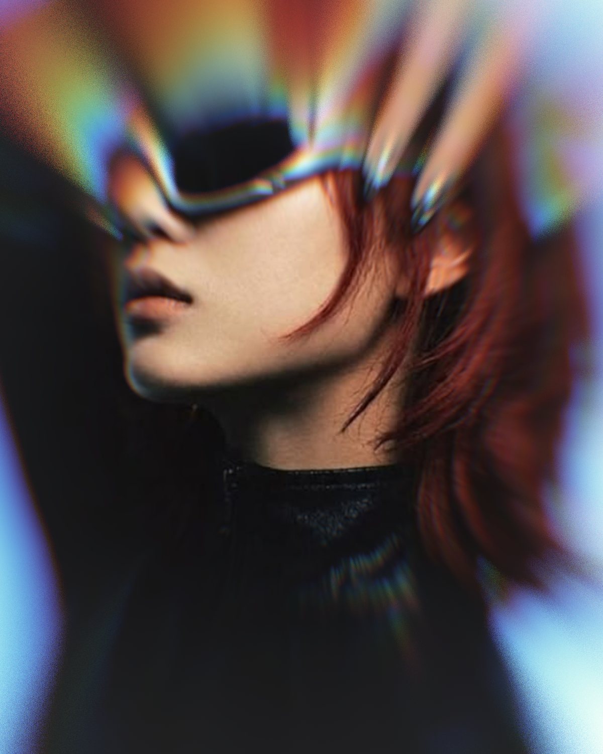 Prism lens effect on a portrait of a woman with red hair in chrome sunglasses, made with the Ghost Lens filter in Filter Archive (Classic preset)