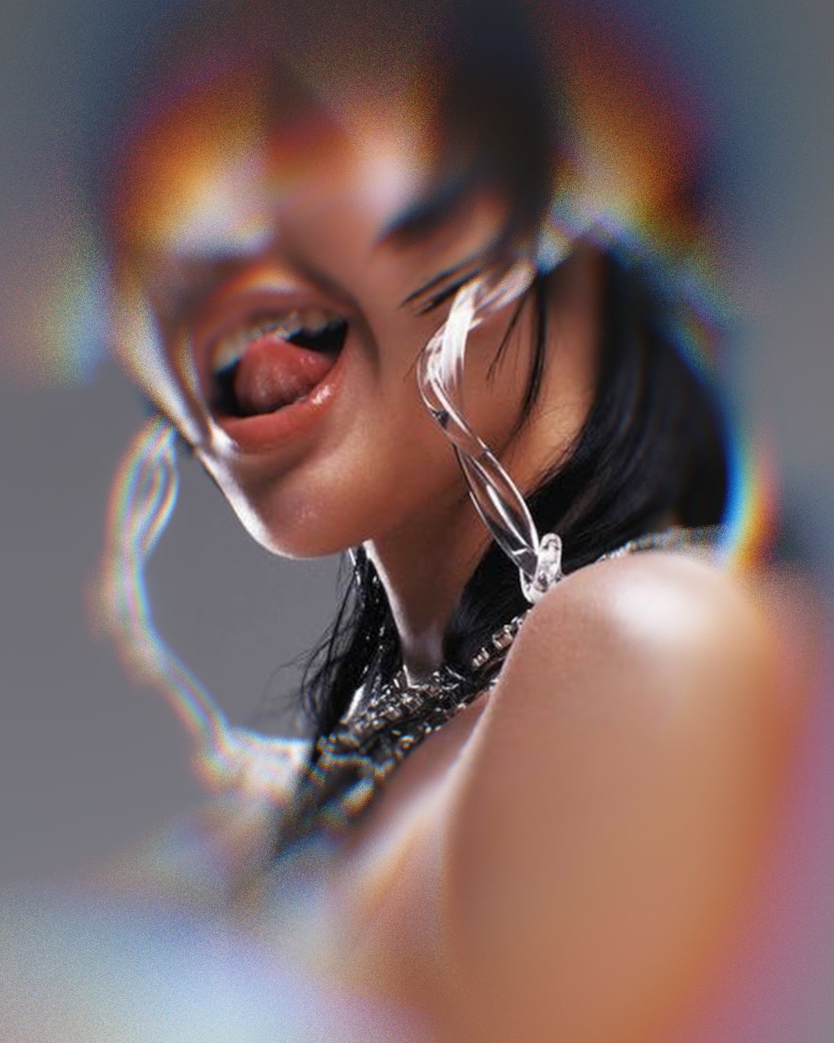 Prism lens effect on a portrait of a woman with silver chains on a grey background, made with the Ghost Lens filter in Filter Archive (Melted preset)