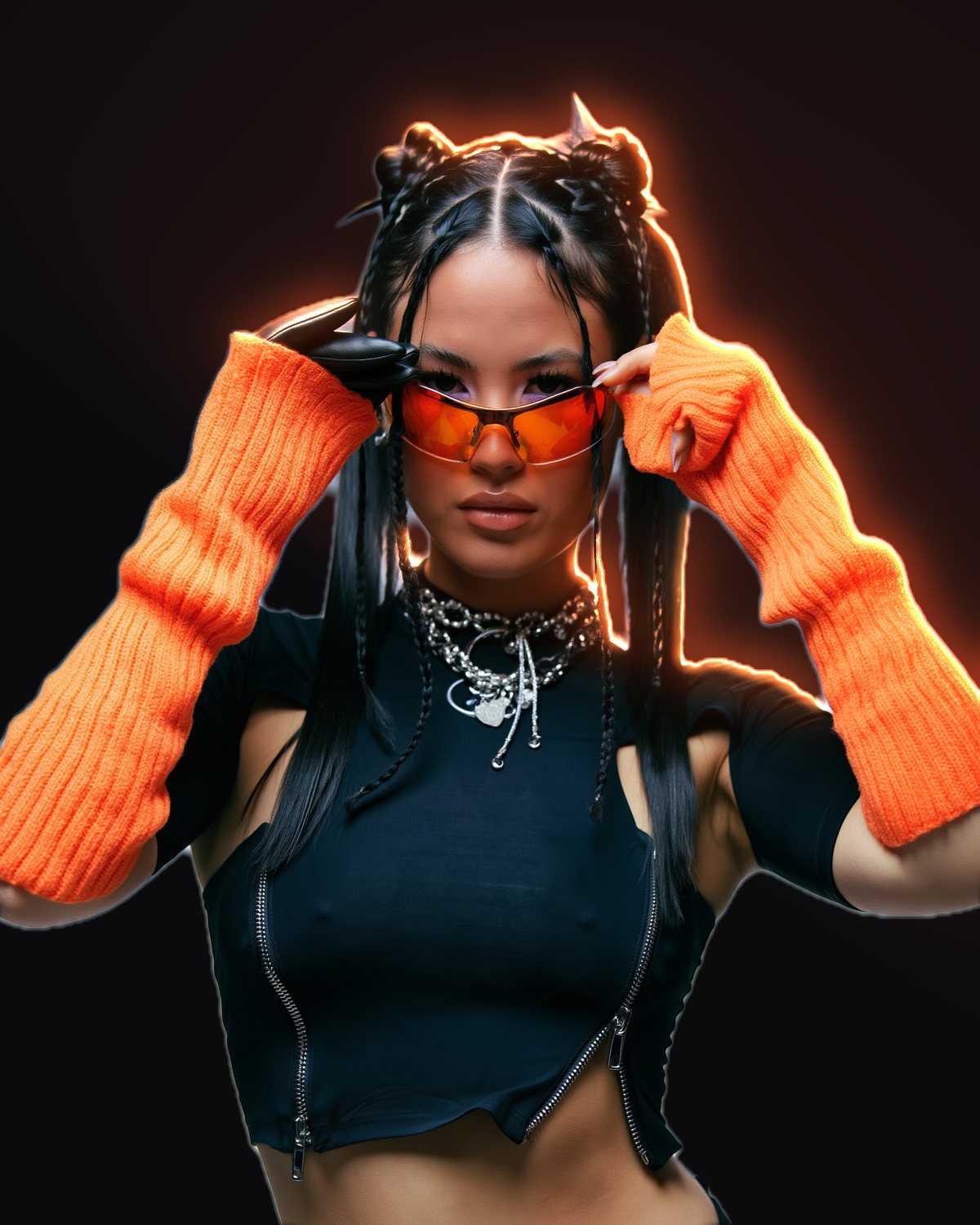 Rim light effect on a portrait of a woman in orange knit sleeves and orange sunglasses, made with the Rim Light filter in Filter Archive (Ember preset)