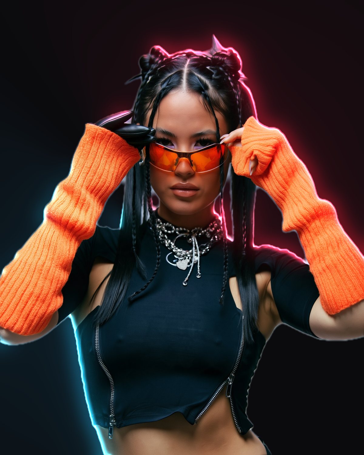 Rim light effect on a portrait of a woman in orange knit sleeves and orange sunglasses, made with the Rim Light filter in Filter Archive (Neon Duo preset)