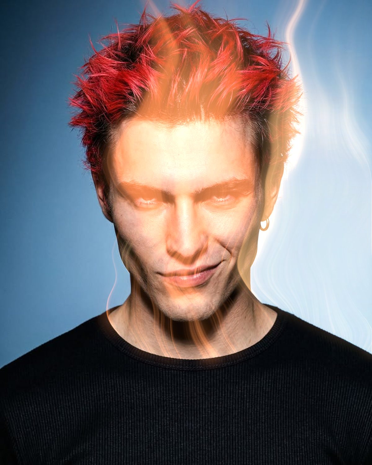 Smoke effect on a portrait of a man with spiky red hair on a blue background, made with the Mist filter in Filter Archive (Ember preset)