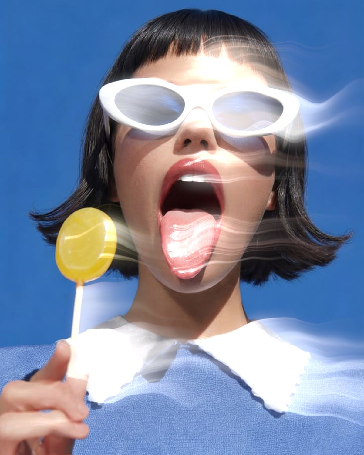 Smoke effect on a portrait of a woman in white sunglasses with a lollipop, made with the Mist filter in Filter Archive (Breath preset)