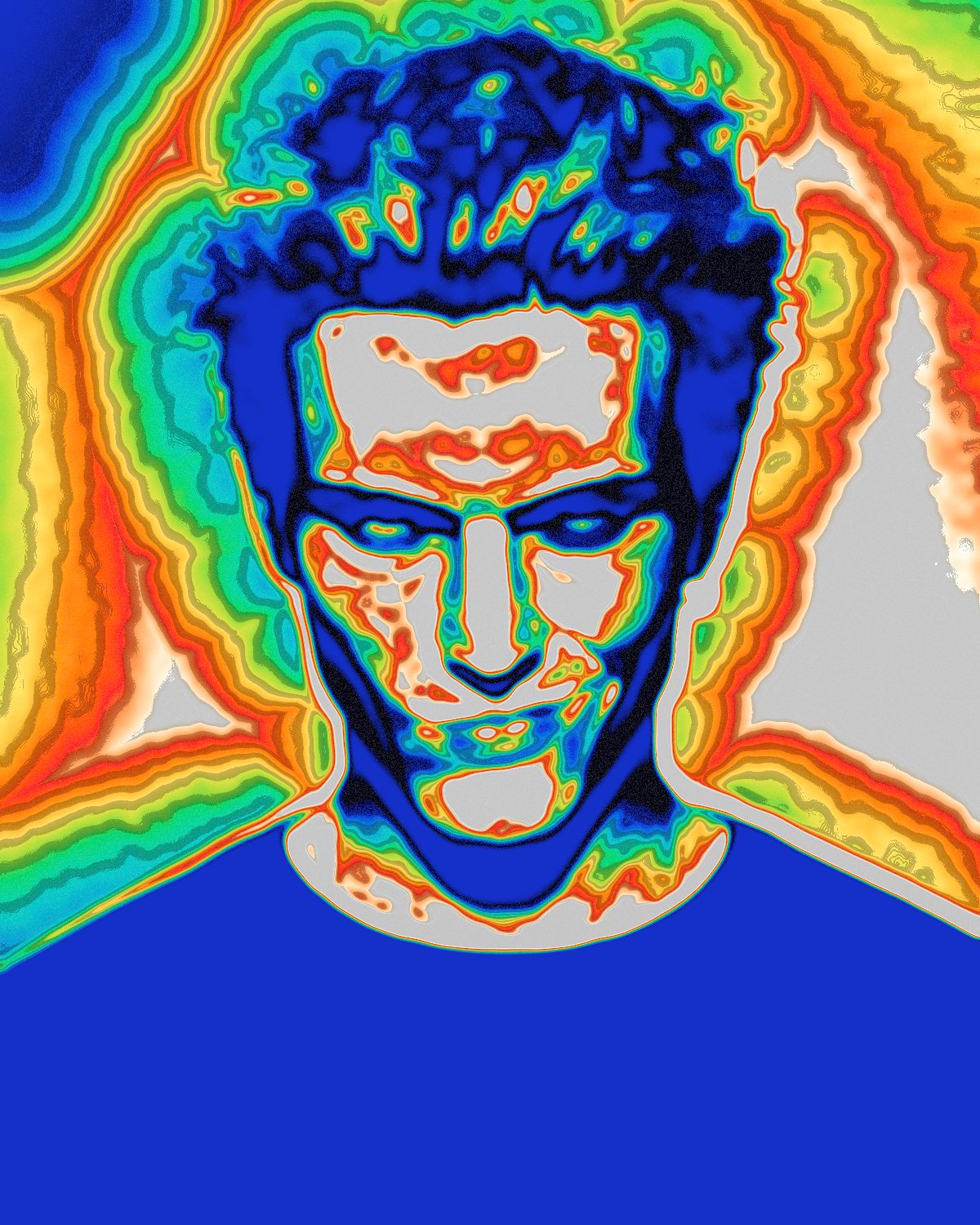 Thermal camera effect on a portrait of a man with spiky red hair on a blue background, made with the Thermal filter in Filter Archive (True Heatmap preset)