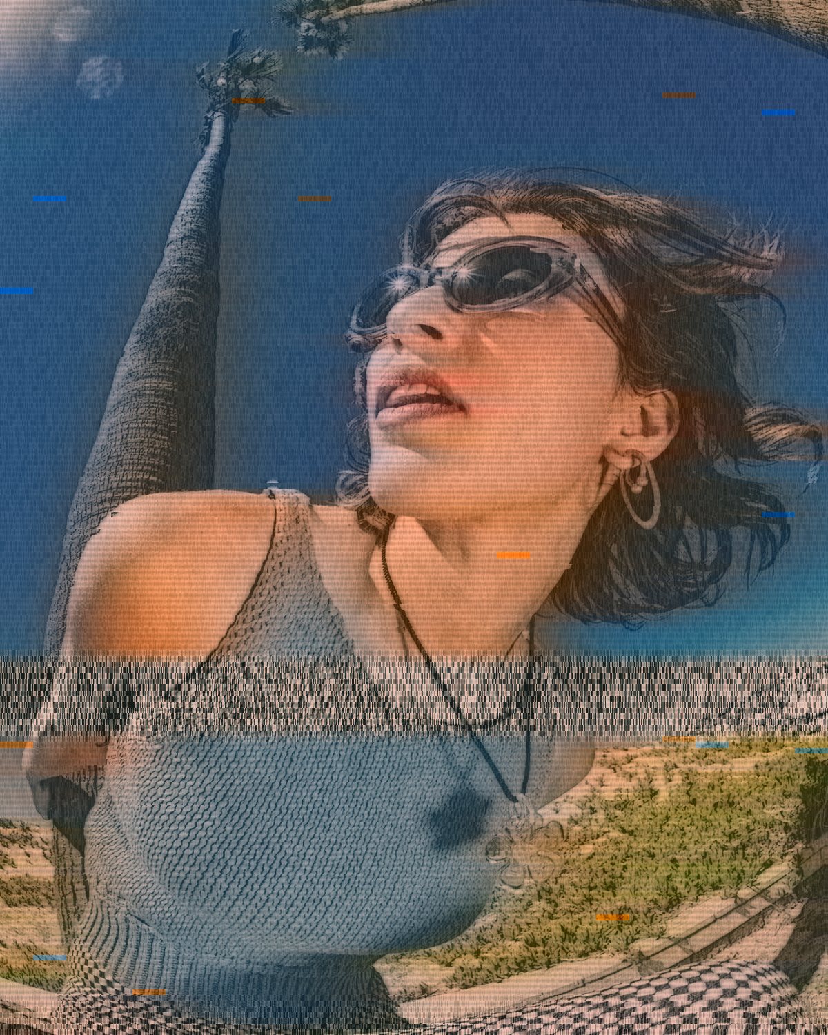 VHS effect on a portrait of a woman in sunglasses against a blue sky, made with the VHS Tape filter in Filter Archive (Sixth Generation preset)